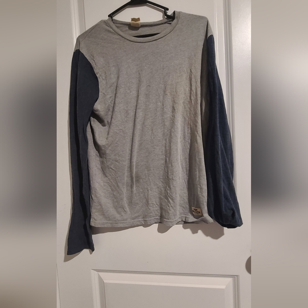 Hollister grey sweater with blue sleeves
